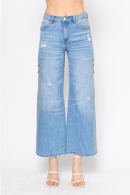 Jeans con aperture laterali